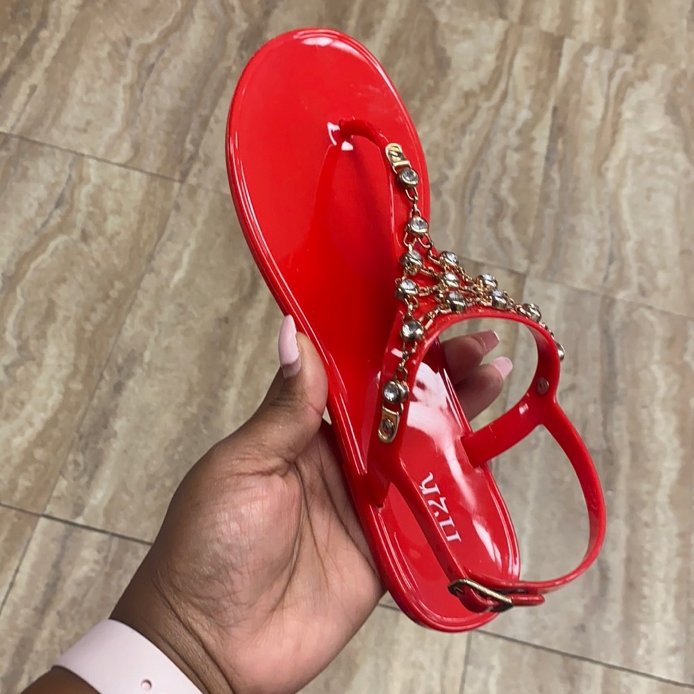Red embellished sandals
